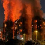 Trece muertos en incendio de complejo residencial en Hong Kong